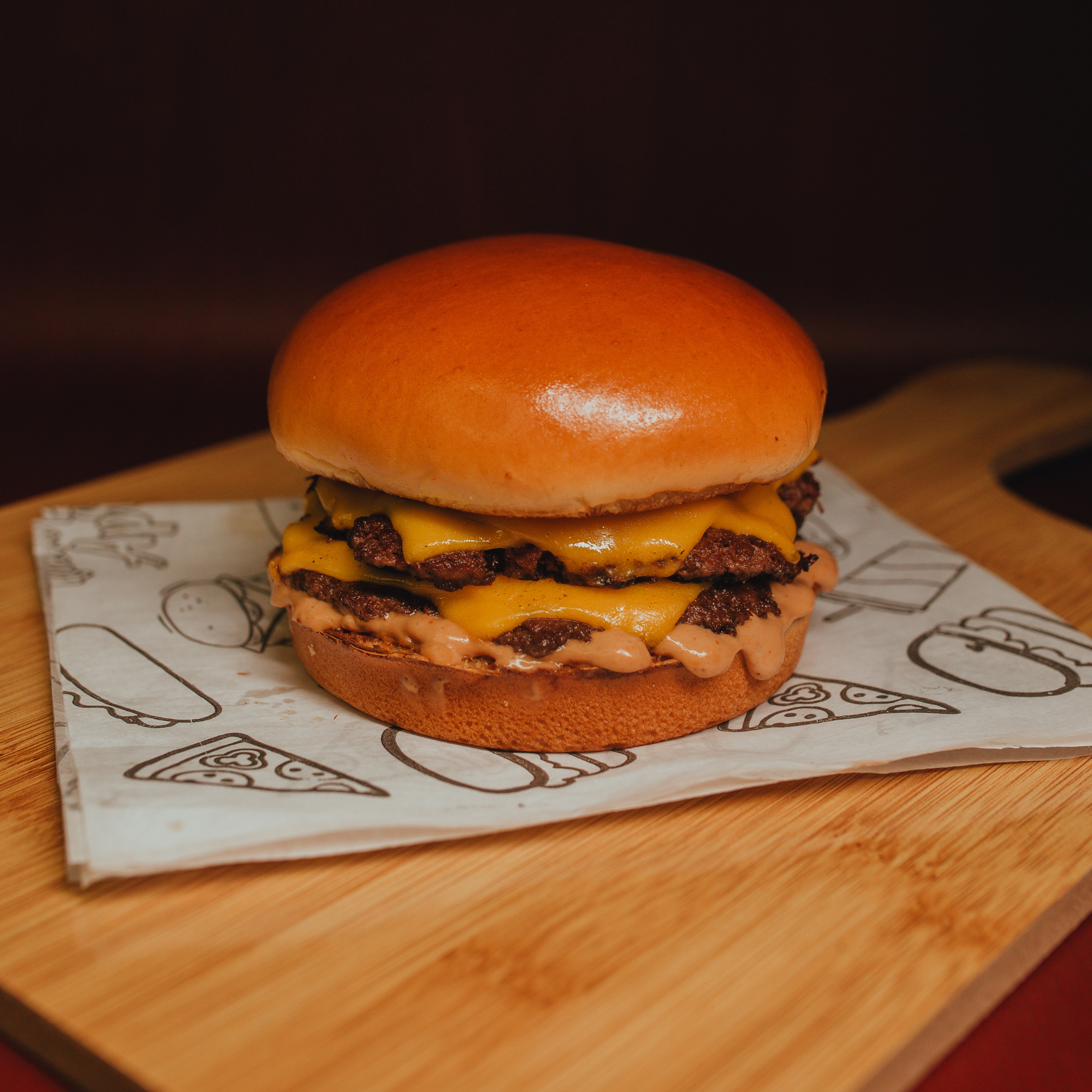 Double smash burger on a board